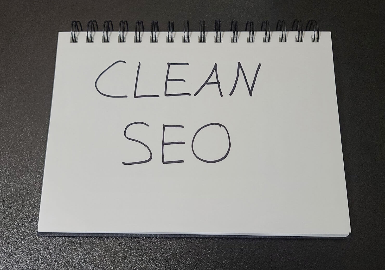 Clean SEO Written in a Notebook